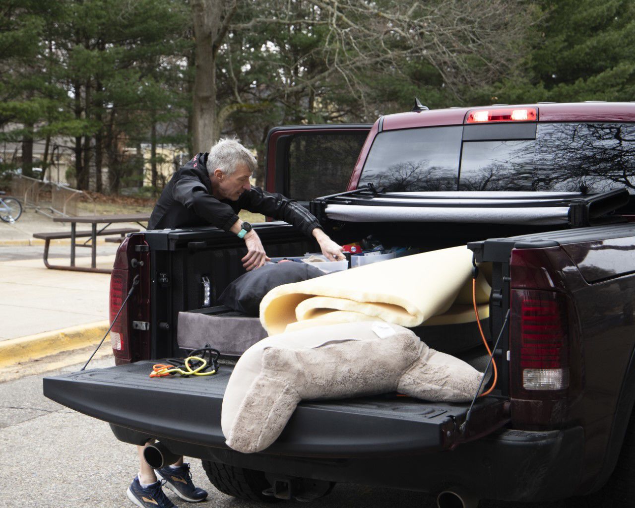 Steve Schmidt packs for his son, Jalen, outside of Hadley Hall.